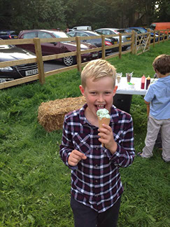 A young man enjoying his ice cream 